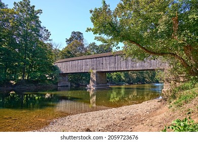 Schofield Ford Covered Bridge At Tyler State Park In Bucks 
County,Pennsylvania. Over Neshaminy Creek With Reflections.
 