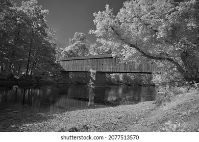 Schofield Ford Covered Bridge At Tyler State Park In Bucks County,Pennsylvania In Scary Black And White Infrared. Over Neshaminy Creek.