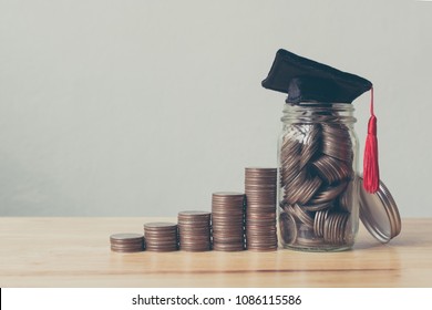 Scholarship money concept. Coins in jar with money stack step growing growth saving money investment