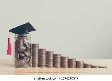 Scholarship money concept. Coins in jar with money stack step growing growth saving money investment