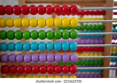 School Abacus With Colorful Beads, Closeup View, Copy Space. Kids Learning, Kids Math Class Concept