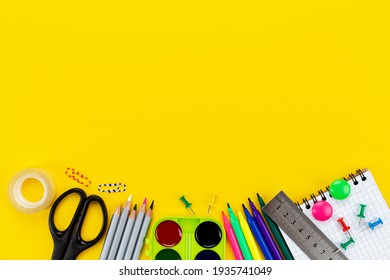 School accessories yellow background  View from above