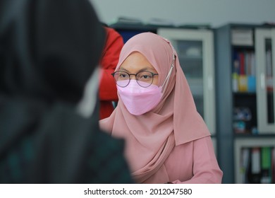 School Administration Employees Wearing Pink Mask, East Java, Surabaya, 2021