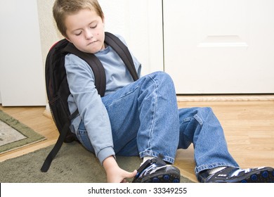 School Age Boy Getting Dressed & Ready For School