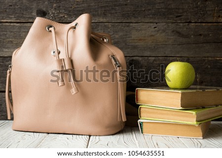 school backpack books Apple on the table