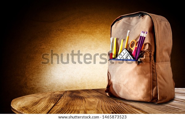 School Backpack On Wooden Board Free Stock Photo Edit Now 1465873523