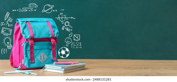 School backpack and stationery on desk in classroom. Banner for design - Powered by Shutterstock