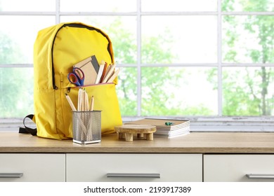 School bacpack on shelf and window background.  - Shutterstock ID 2193917389