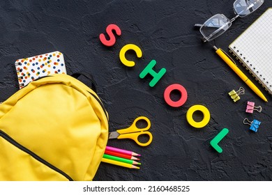 School Bag With With Colorful School Items, Top View