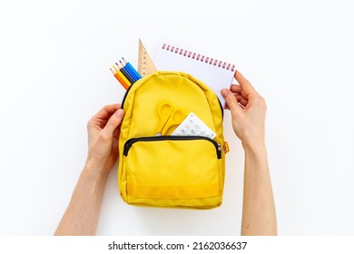 School Bag With With Colorful School Items, Top View