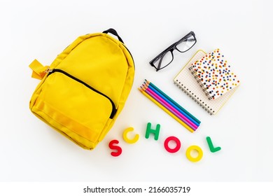 School Bag With With Colorful School Items, Top View