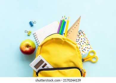 School Bag With With Colorful School Items, Top View