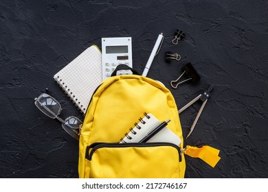 School Bag With With Colorful School Items, Top View