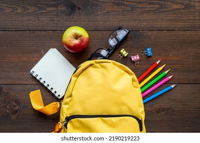 School Bag With With Colorful School Items, Top View