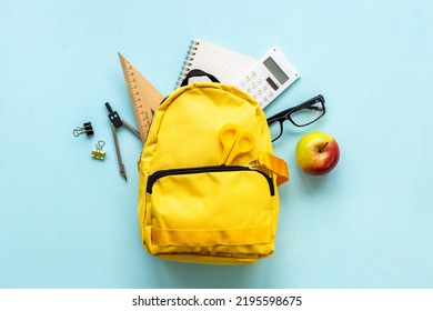 School Bag With With Colorful School Items, Top View