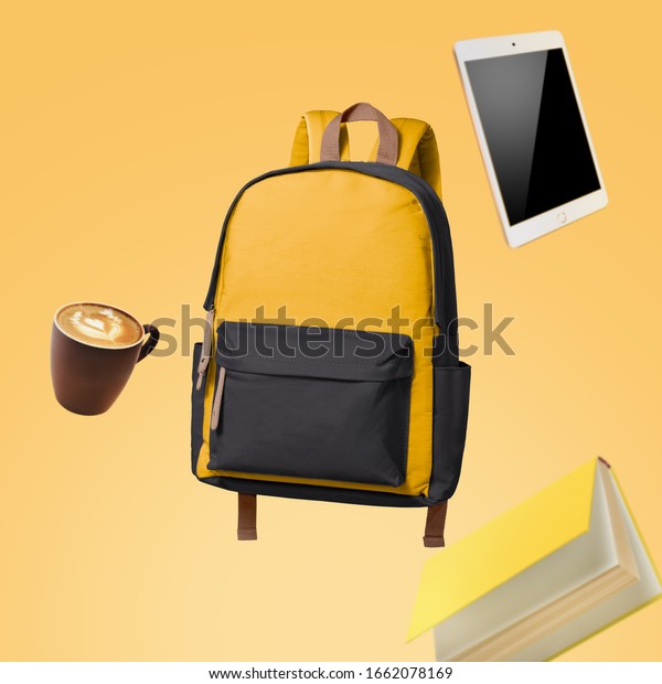 School bag floating with school items
advertising photography