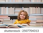 School books and education concept. Kid on school library. Child reading book at school. Nerd pupil studying in classroom. Clever intelligent schoolboy overwork. Smart child learning to read book