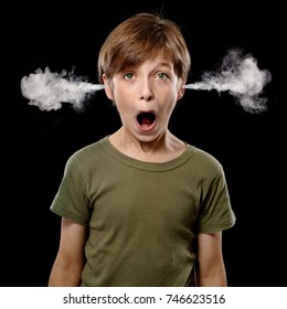 School Boy being over worked and shocked with all the homework he gets: Steam comes out of his Ears, Isolated on Black Background