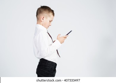 School Boy Child With Tablet Pc On White Background Isolated