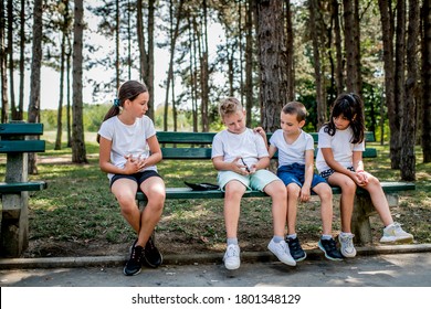 School Boy With Diabetes Testing His Blood Sugar After Physical Education, Friends Support Him.