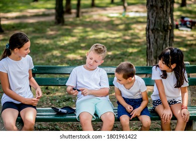 School Boy With Diabetes Testing His Blood Sugar After Physical Education, Friends Support Him.