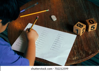 A School Boy Doing His 1st Grade Math Homework.