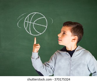 School Boy With Hand Drawn Basketball On Green Chalkboard