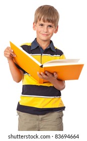 School Boy Is Holding A Book Isolated On White Background