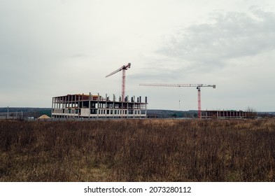 School Building Under Construction.  Tower Cranes.