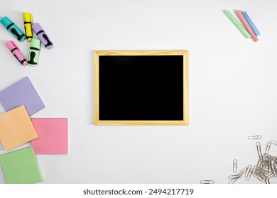 School bulletin board. Back to School.  New school year. Stickers, markers and paper clips. School background - Powered by Shutterstock