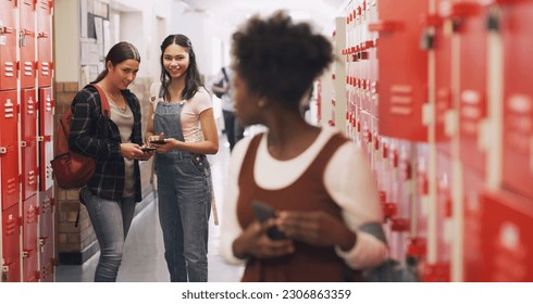 School bully and a girl with a phone for a secret, gossip or rude message online. Sad, anxiety and an African student on a mobile app with group whisper from students doing cyber bullying at class - Powered by Shutterstock