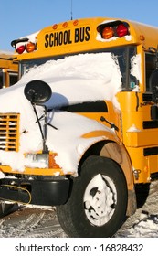 A School Bus Covered With Fresh Snow.