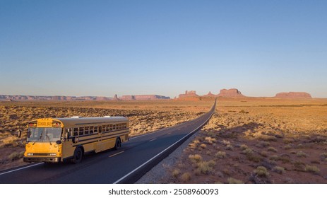 School bus drives on lonely desert road Monument Valley Forrest Gump  - Powered by Shutterstock