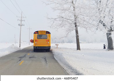 School Bus On Winter Morning In Rural Area.