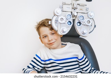 A School Child Doing Eye Test In Clinic