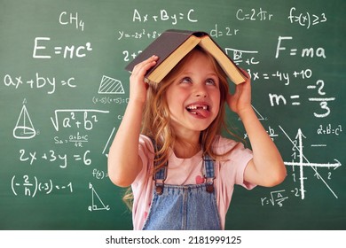School child (girl) in classroom. Funny kid against green chalkboard. Idea and creativity concept. Copyspace on background. Back to school concept.  - Shutterstock ID 2181999125
