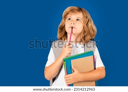 School child on isolated background. Thinking pensive kids, thoughtful emotions of school child, clever smart funny nerd have idea. School dream. Daydreamer school child. Dreams and imagination.