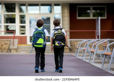 School children, boys, going back to school after the summer vacation, kids going to school - Shutterstock ID 2193046495