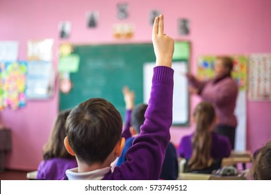 school children are participating actively in class. - Powered by Shutterstock