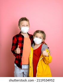 School Children In Protect Mask Ready To Go To School. Back To School. Pupil Isolated On Pink. Happy Kid Hug Each Other. Two Kids In Safety Mask. Face Mask