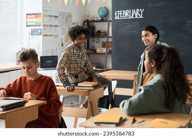 School children talking during break - Powered by Shutterstock