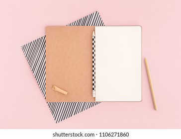 School Design Flat Lay With Notepad And Pen On A Pink Background.