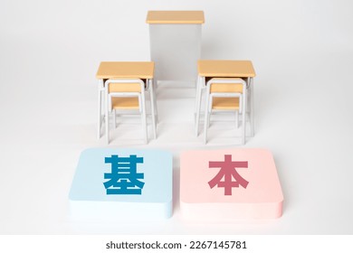 A school desk and the word 