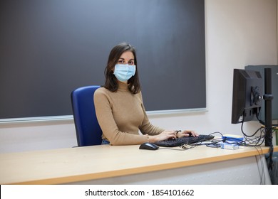 School During Covid Pandemics Female Teacher With Face Mask