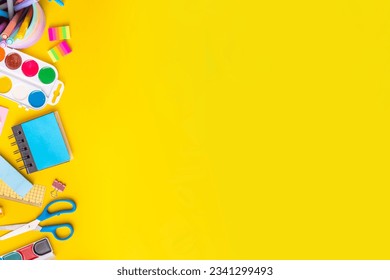 School equipment high-colored bright yellow flat lay. Various school education and office supplies, accessories. Back to school sale background top view copy space - Powered by Shutterstock