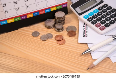 School Fee Past Due Final Notice Letter, Education Fee, Desk Calendar, Calculator, Money Coin, Pen And Pencil On Wooden Table. School Due Date Concept.