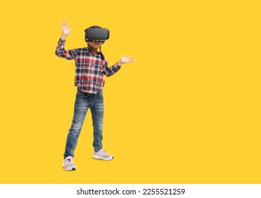 School girl, Happy Asian student school kid with using vr headset. virtual reality glasses pointing, Full body portrait isolate on yellow background with clipping path for design work - Powered by Shutterstock