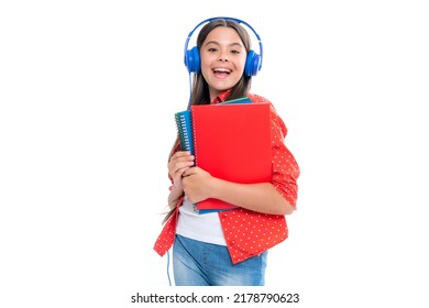 School Girl, Teenage Student In Headphones And Books On Isolated Studio Background. School Kids With Backpack. Portrait Of Emotional Amazed Excited Teen Girl.