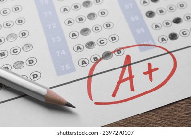 School grade. Answer sheet with red letter A, plus symbol and pencil on wooden table, closeup