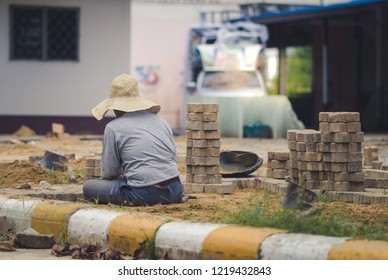 School Janitor Builds A Brick Pathway In School